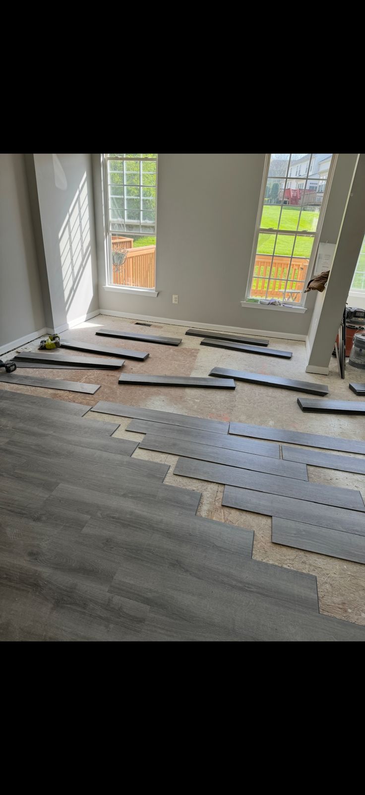 Professional hardwood floor installation in progress